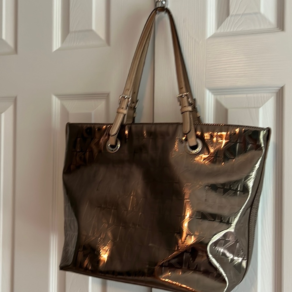 Michael Kors metallic gold  tote 17”length  x 12” tall.